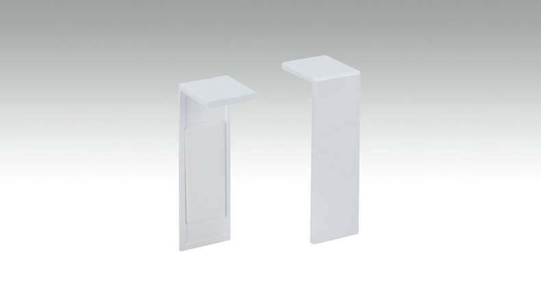 Pièce de jonction autocollante pour plinthe F100201M Modern White 18 x 50 mm - 2pcs.